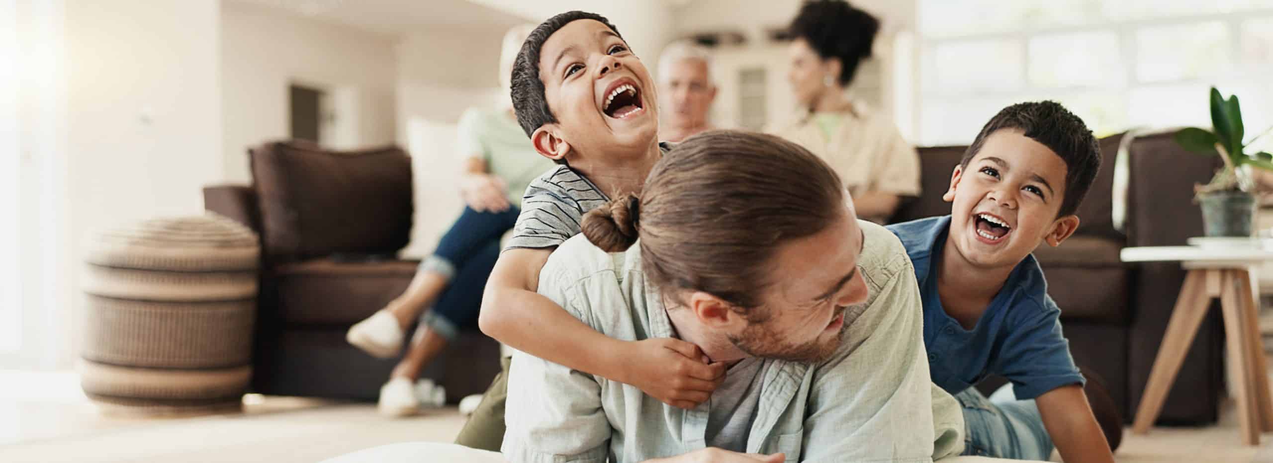 family laughing together in Mount Pleasant WI