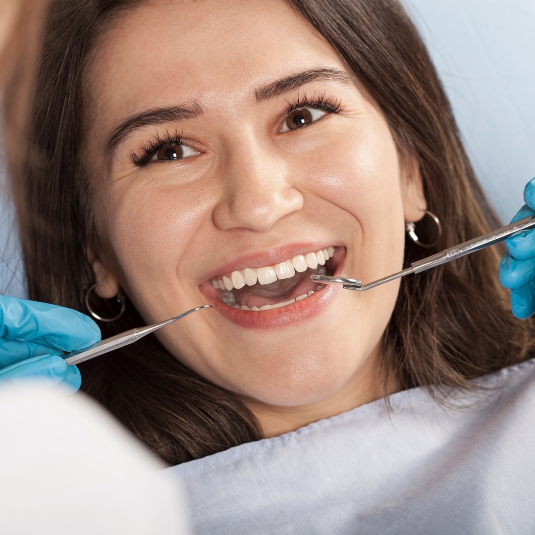 woman during dentist appointment at oxford dental in Mount Pleasant WI