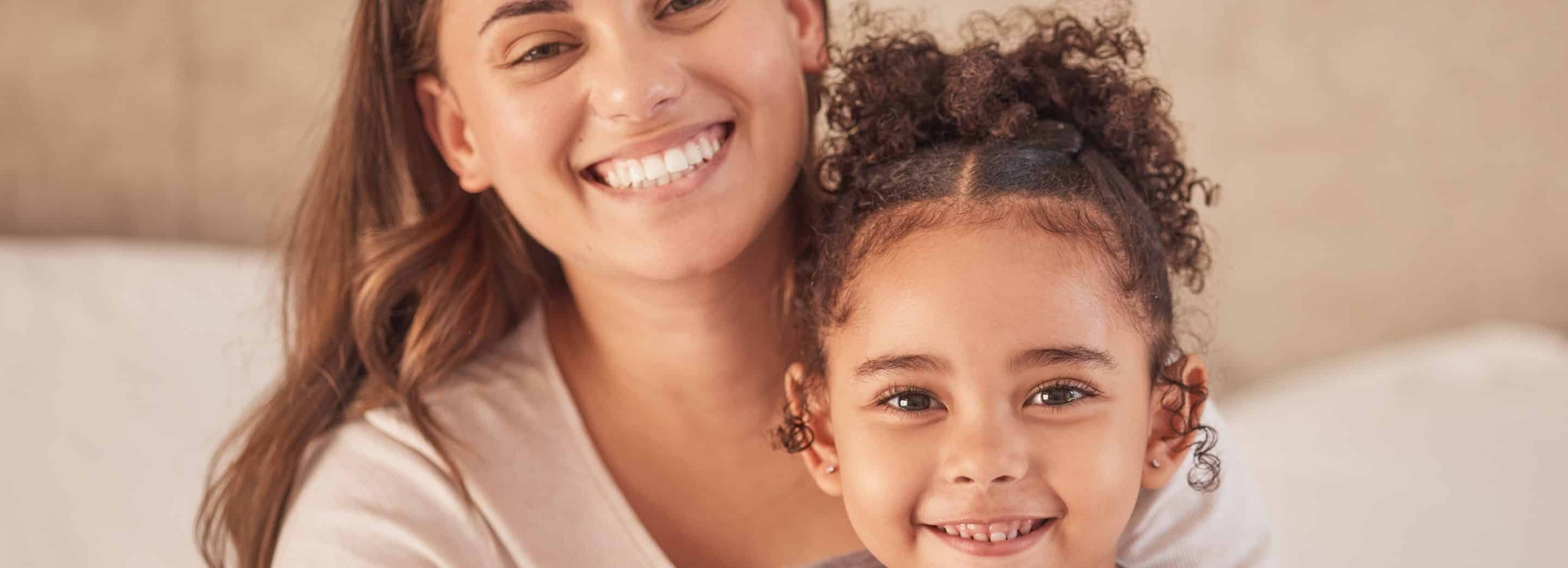 mother and daughter smiling in Mount Pleasant, WI