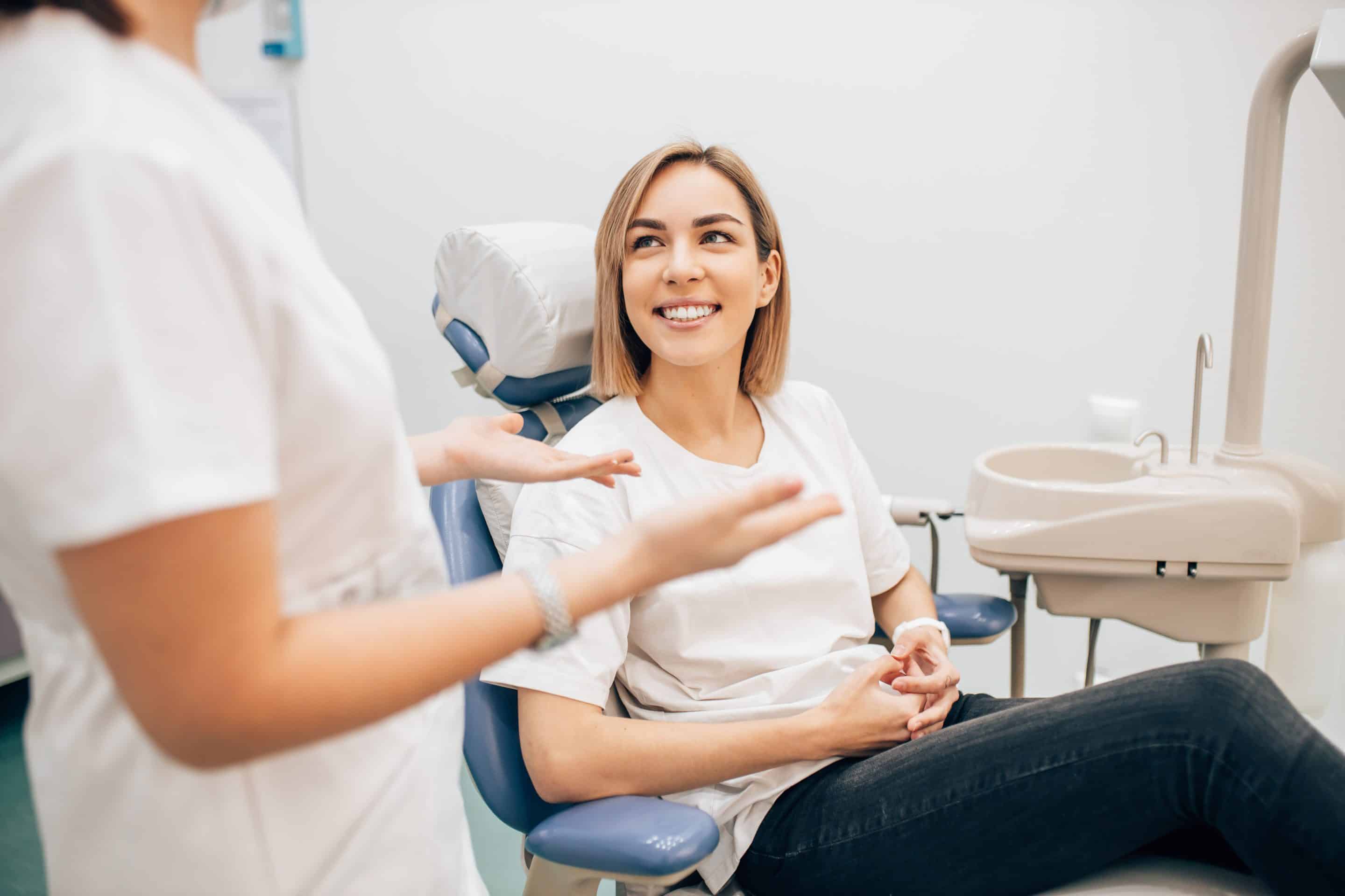 dental patient speaking with  Dr. Arsalan Augend during root canal appointment at oxford dental