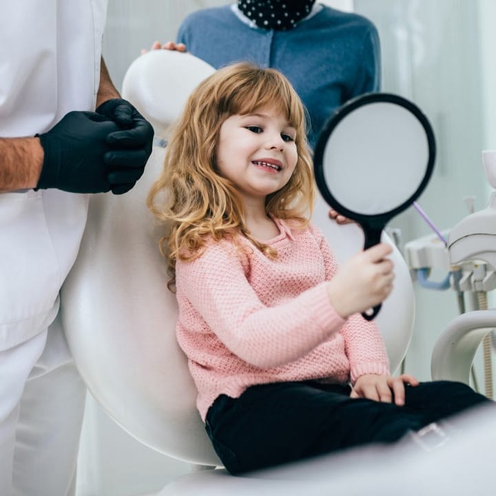 woman during dentist appointment at oxford dental in Mount Pleasant WI