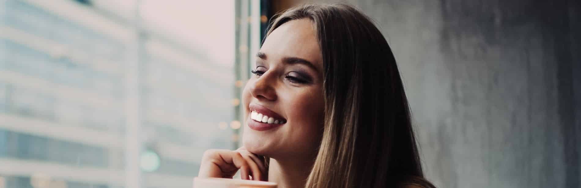 patients enjoying his new dental veneers from Oxford Dental in Mount Pleasant WI